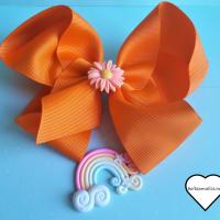 Barrette noeud orange fleur